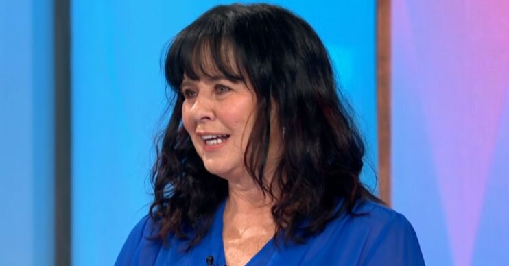 Coleen Nolan smiling in blue top on Loose Women
