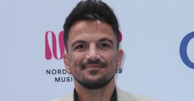 Peter Andre smiling at event