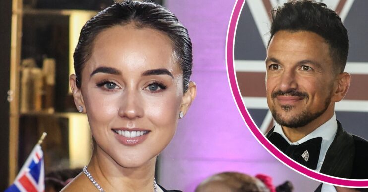 Peter Andre and wife Emily smiling at the Pride of Britain Awards