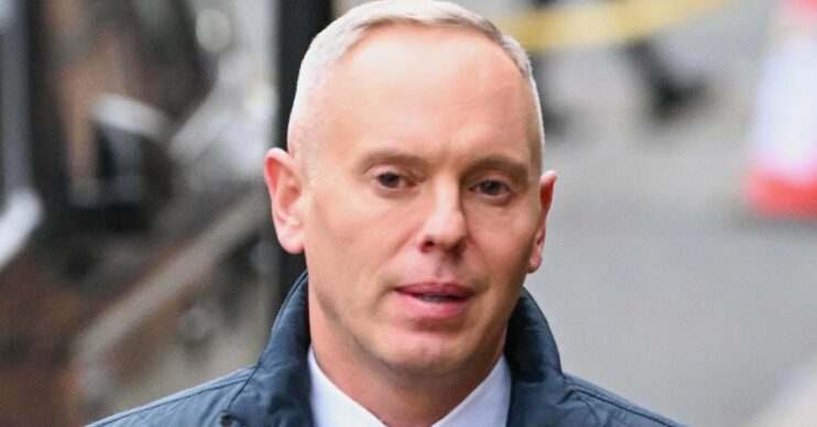 Rob Rinder looking sombre on outing