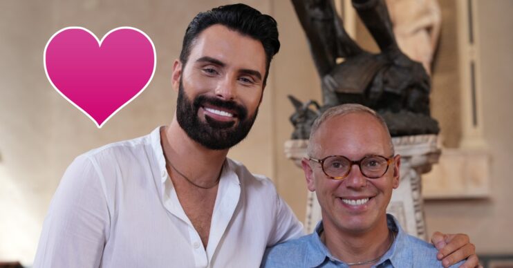 Rylan Clark and Rob Rinder smiling at the camera / a love heart emoji