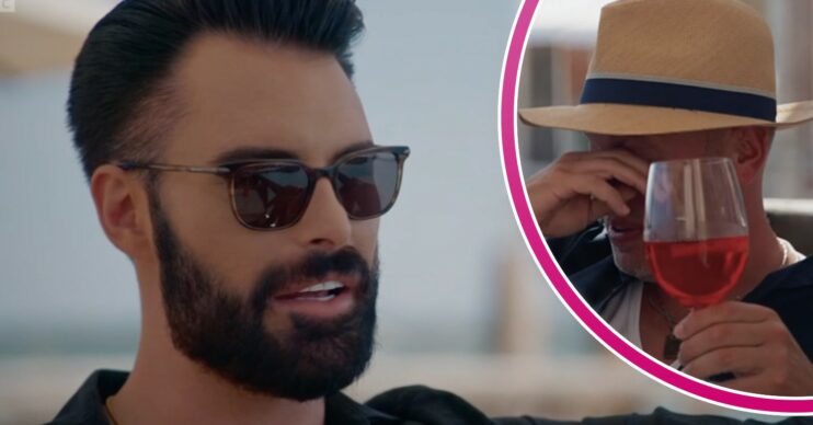 Rylan Clark talking as Rob Rinder wipes away tears on travel show