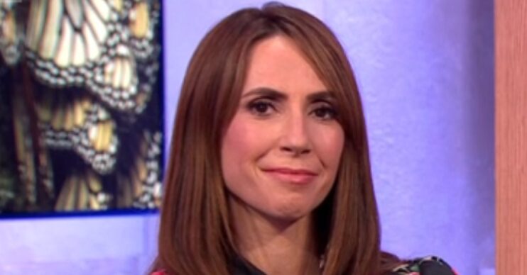 Alex Jones with awkward expression on The One Show